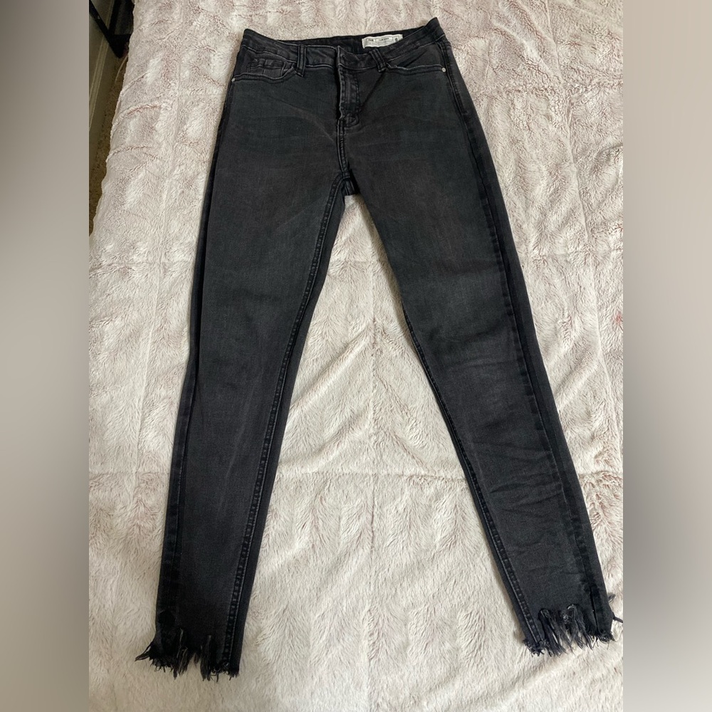 Women's Washed Black Skinny Jeans with Frayed Hem
